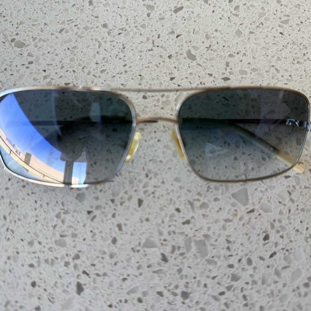 Oliver Peoples Silver metal frames with photo-chromatic lens
